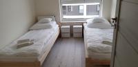 Posteľ alebo postele v izbe v ubytovaní Apartament Kraków Arena