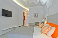 Posteľ alebo postele v izbe v ubytovaní Venezia Bungalows