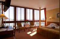 Łóżko lub łóżka w pokoju w obiekcie Hotel Willa Lubicz