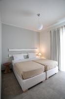 Posteľ alebo postele v izbe v ubytovaní Sweet Home Naxos