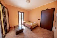 A bed or beds in a room at Villa Lavanda