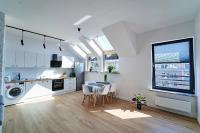 Kuchyňa alebo kuchynka v ubytovaní Apartamenty Muzyczna 14