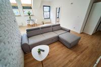 Posedenie v ubytovaní Apartamenty Muzyczna 14