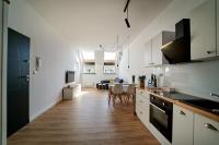 Kuchyňa alebo kuchynka v ubytovaní Apartamenty Muzyczna 14