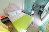 Posteľ alebo postele v izbe v ubytovaní Irida Beach Resort Suites