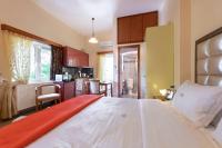 Posteľ alebo postele v izbe v ubytovaní Irida Beach Resort Suites