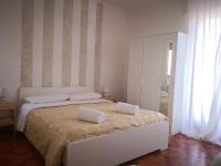 Posteľ alebo postele v izbe v ubytovaní Casa Immacolata Affittacamere