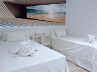 Postel nebo postele na pokoji v ubytování Casa Fuerte Playa