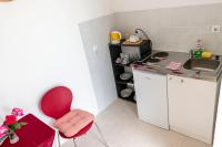 Kuchyň nebo kuchyňský kout v ubytování Dino and Jele Apartments