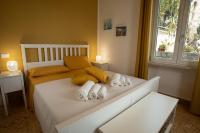 Posteľ alebo postele v izbe v ubytovaní Villa Aurora Mondello Addaura