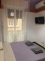 Televízia a/alebo spoločenská miestnosť v ubytovaní marconi 22 rooms