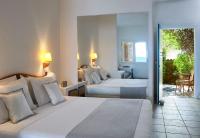 Posteľ alebo postele v izbe v ubytovaní Plaka Sea Front Residence