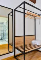 a room with glass dividers in a house at Hotel Garden Court in Prague