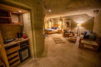Postel nebo postele na pokoji v ubytování Azure Cave Suites - Cappadocia