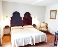 Postel nebo postele na pokoji v ubytování Hotel Iberia Plaza Mayor