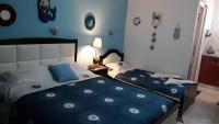 Posteľ alebo postele v izbe v ubytovaní House Stella Tasos