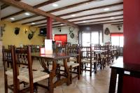 Reštaurácia alebo iné gastronomické zariadenie v ubytovaní Hotel Rocio