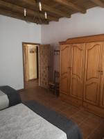 Posteľ alebo postele v izbe v ubytovaní CASA RURAL LA DEHESILLA