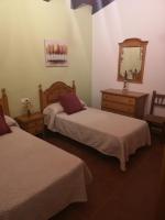 Posteľ alebo postele v izbe v ubytovaní CASA RURAL LA DEHESILLA