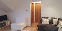 Televízia a/alebo spoločenská miestnosť v ubytovaní Sunrise 3 Apartment