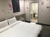 &#x5FC3;&#x5712;&#x751F;&#x6D3B;&#x65C5;&#x5E97; Xin Yuan Hotel&#x623F;&#x9593;&#x7684;&#x5E8A;