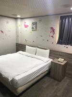 &#x5FC3;&#x5712;&#x751F;&#x6D3B;&#x65C5;&#x5E97; Xin Yuan Hotel&#x623F;&#x9593;&#x7684;&#x5E8A;