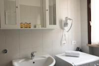 Kúpeľňa v ubytovaní Sirmione Acque del Garda Apartments