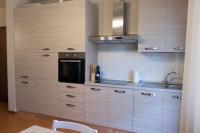 Kuchyňa alebo kuchynka v ubytovaní Sirmione Acque del Garda Apartments