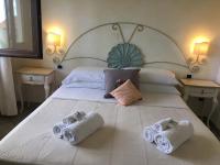 Posteľ alebo postele v izbe v ubytovaní Hotel Sorgente