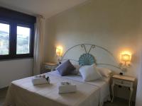 Posteľ alebo postele v izbe v ubytovaní Hotel Sorgente