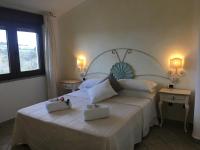 Posteľ alebo postele v izbe v ubytovaní Hotel Sorgente