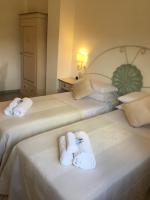 Posteľ alebo postele v izbe v ubytovaní Hotel Sorgente