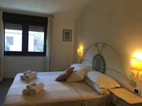 Posteľ alebo postele v izbe v ubytovaní Hotel Sorgente