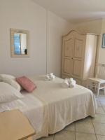 Posteľ alebo postele v izbe v ubytovaní Hotel Sorgente