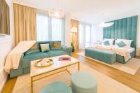 Postel nebo postele na pokoji v ubytování Boutique Apartments Blagoevgrad
