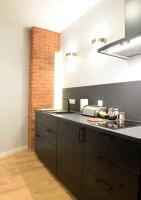 Kuchyň nebo kuchyňský kout v ubytování Apartamenty Gaja