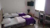 Posteľ alebo postele v izbe v ubytovaní Guest House Villa Herbarium
