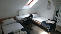 Posteľ alebo postele v izbe v ubytovaní Guest House Villa Herbarium