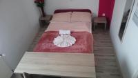 Posteľ alebo postele v izbe v ubytovaní Guest House Villa Herbarium