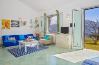 Televízia a/alebo spoločenská miestnosť v ubytovaní Villa Sirena - Scopello-Villas