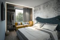 Posteľ alebo postele v izbe v ubytovaní Hotel Rainers21