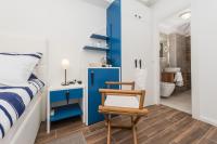 Posteľ alebo postele v izbe v ubytovaní Blue Old Navy Rooms - AE1094