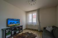 TV a/nebo společenská místnost v ubytování Unique Charles Bridge 2BDR Apartment.