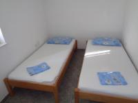 Posteľ alebo postele v izbe v ubytovaní Apartments Radoš
