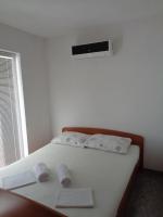 Posteľ alebo postele v izbe v ubytovaní Apartments Radoš