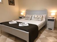 A bed or beds in a room at Villa Arzilla Sardegna