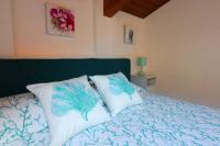Posteľ alebo postele v izbe v ubytovaní Anthony House - De Vivo Realty Sorrento