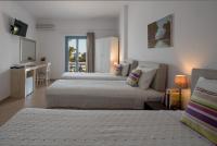 Posteľ alebo postele v izbe v ubytovaní Caldera Romantica Hotel