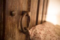 A bed or beds in a room at Casa delle rose