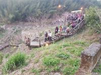 a group of people on a bridge over a hill at Ming Yang B&amp;B in Fenqihu